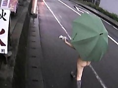 Yuka Kurihara walks naked flashing the public in the rain
